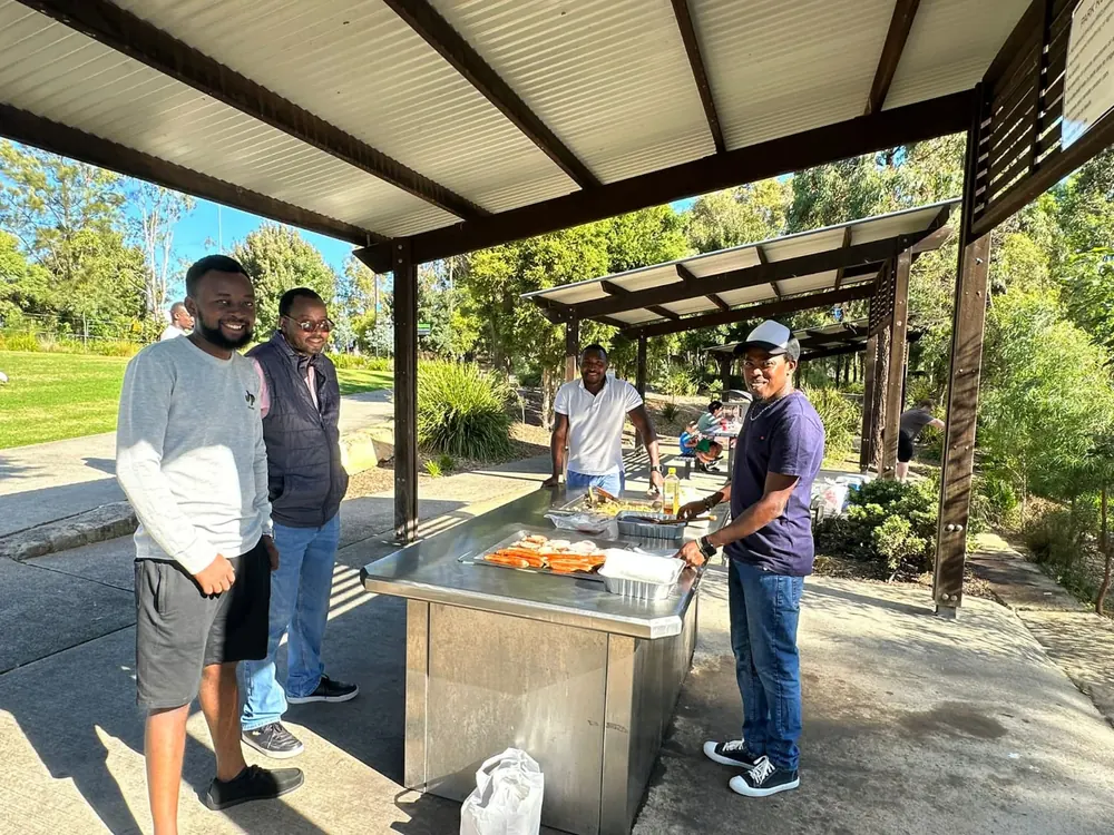 Members sharing a barbecue